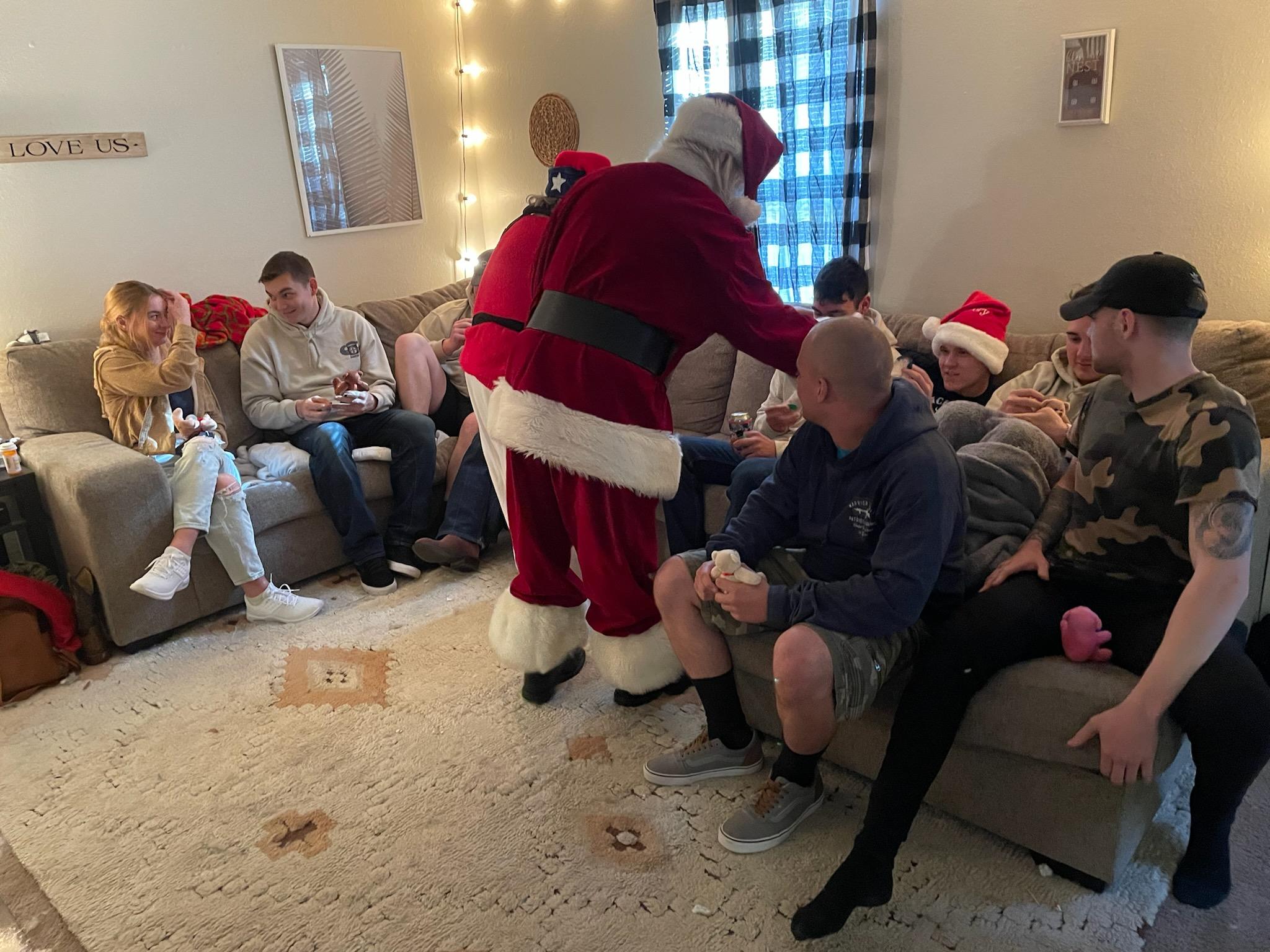 Santa handing out gifts